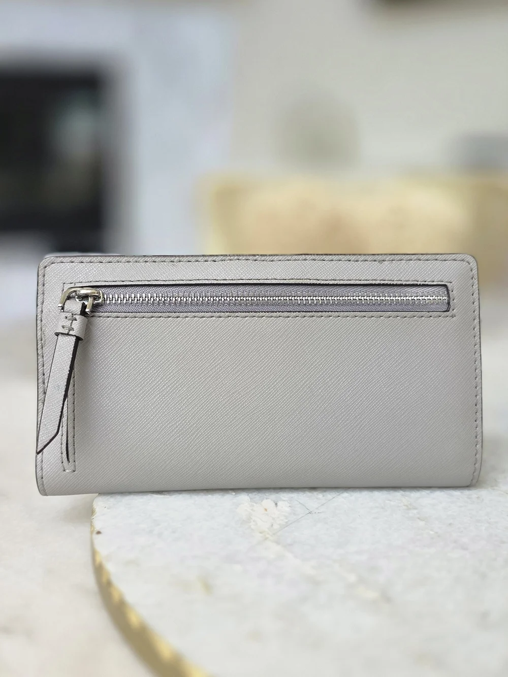 Kate Spade New York Gray Saffiano Large Slim Bifold Wallet Silver Logo
